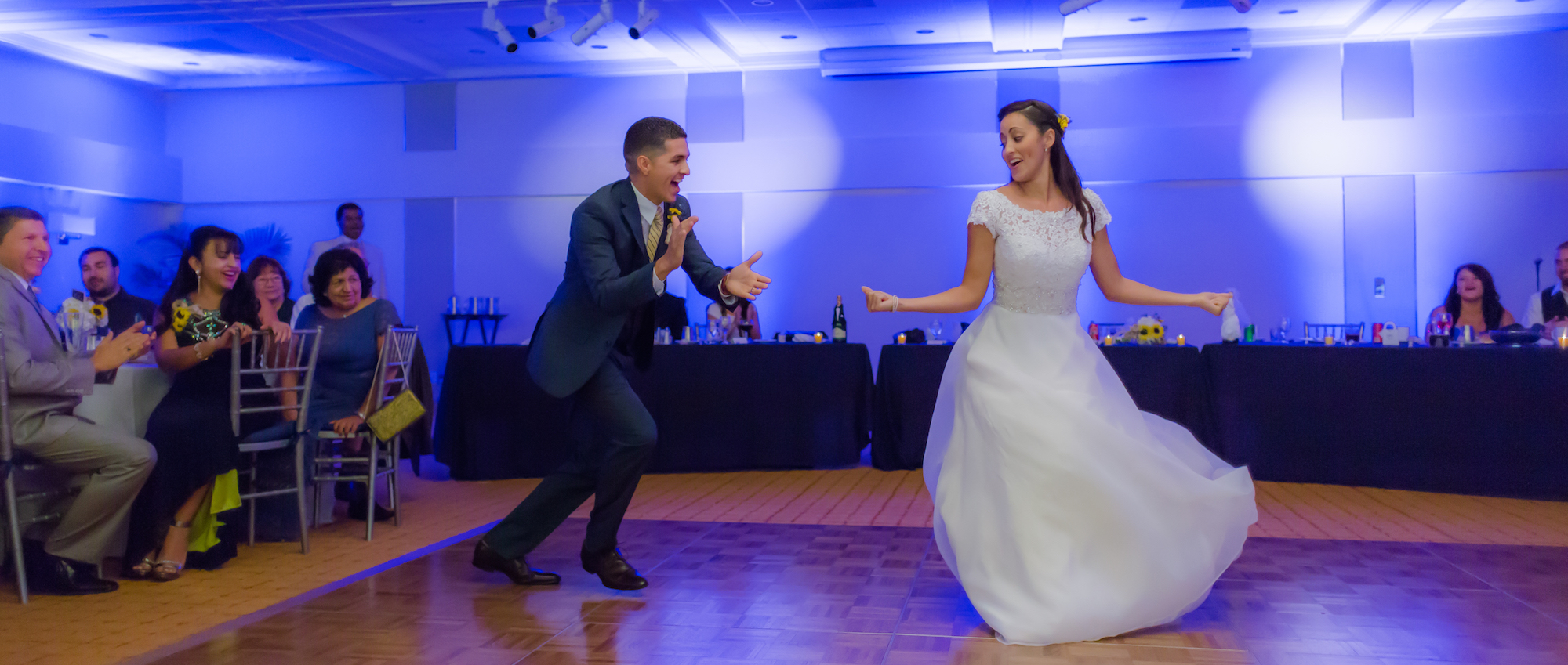 Bride and groom dancing during the wedding reception by Alfredo Valentine Couture Bridal Photography Alfredo Valentine