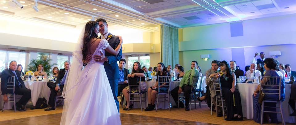 Lakeside Terrace Wedding day reception bride and grooms first dance by Couture Bridal Photography