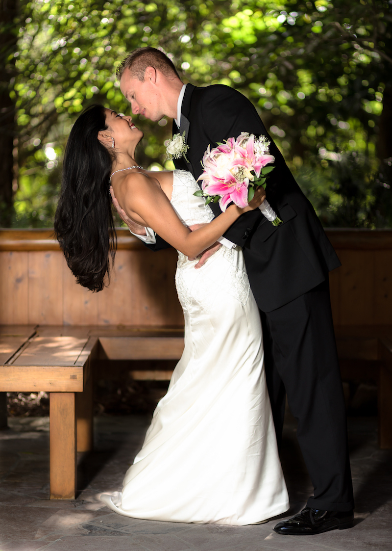 Wedding Photography at Morikami Japanese gardens by Delray Beach Wedding Photographer. Bride and groom kissing at Morikami Japanese Gardens Delray Beach Florida