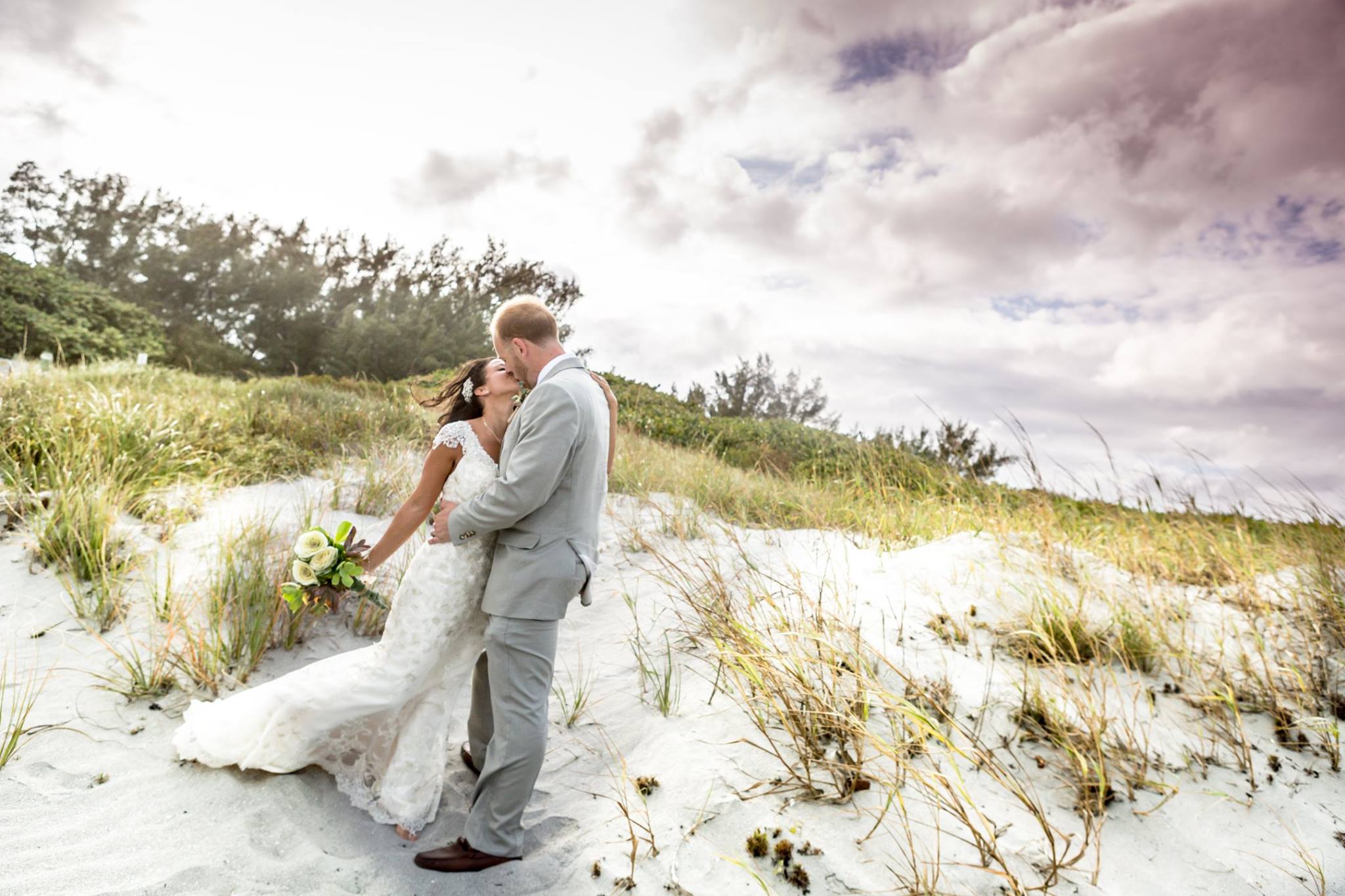 Wedding Photography Videography image of bride and groom on Delray Beach after wedding day ceremony by Fort Lauderdale Photographer Alfredo Valentine Couture Bridal Photography