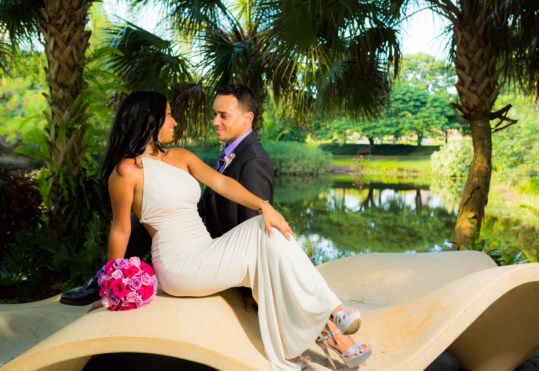 Bride and groom posed at a park for their bridal portraits during the cocktail hour of there Harriet Himmel Theatre Wedding. Photography by Couture Bridal Photography, a Harriet Himmel Theatre Wedding Photographer