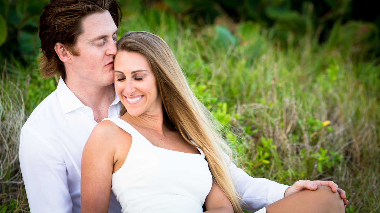 Fort Lauderdale Luxury Wedding Photography by Couture Bridal Photography bride and groom in a playful embrace.