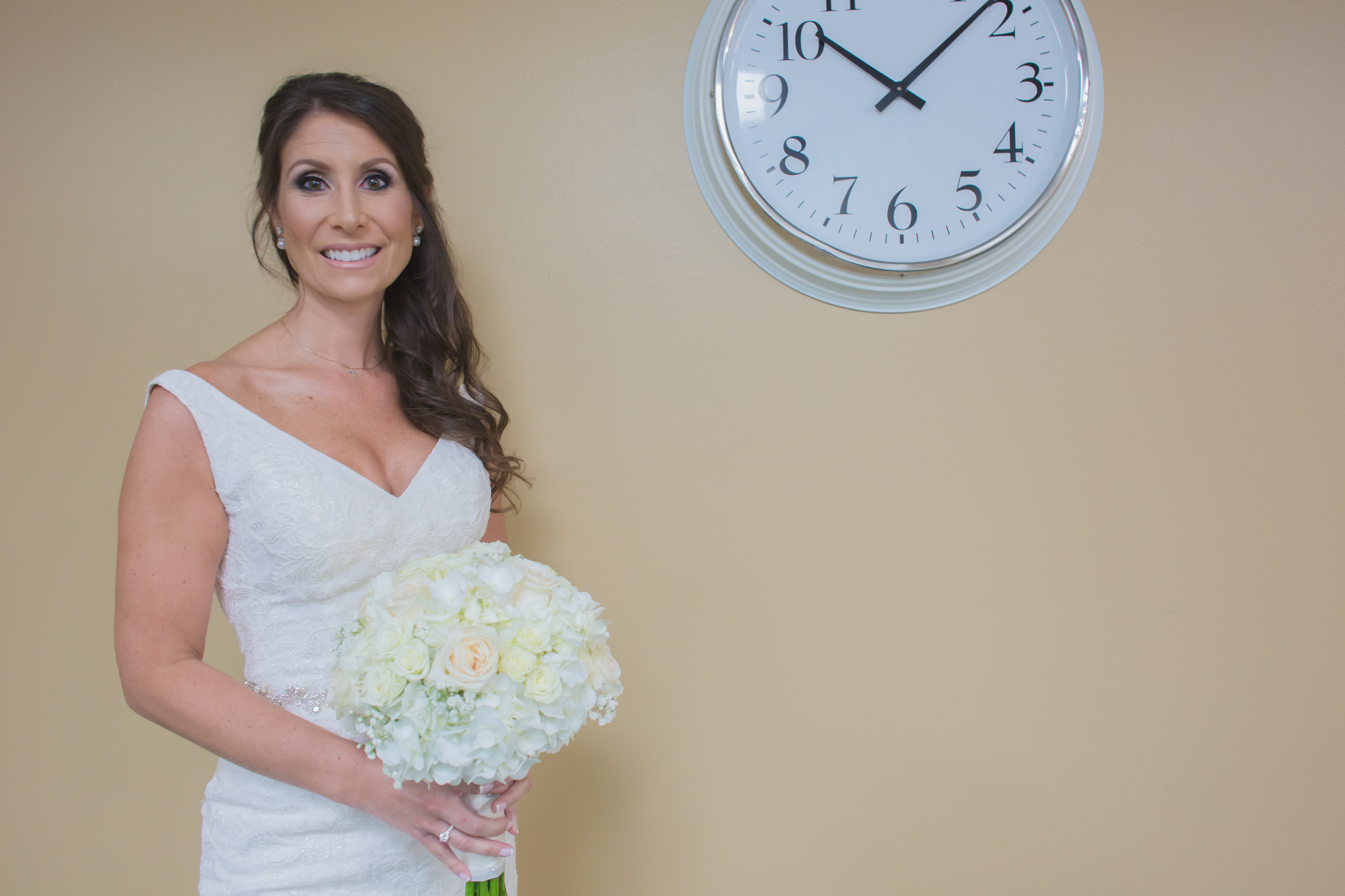 Photo of the bride right before she walks down the isle to her new husband right before her wedding ceremony