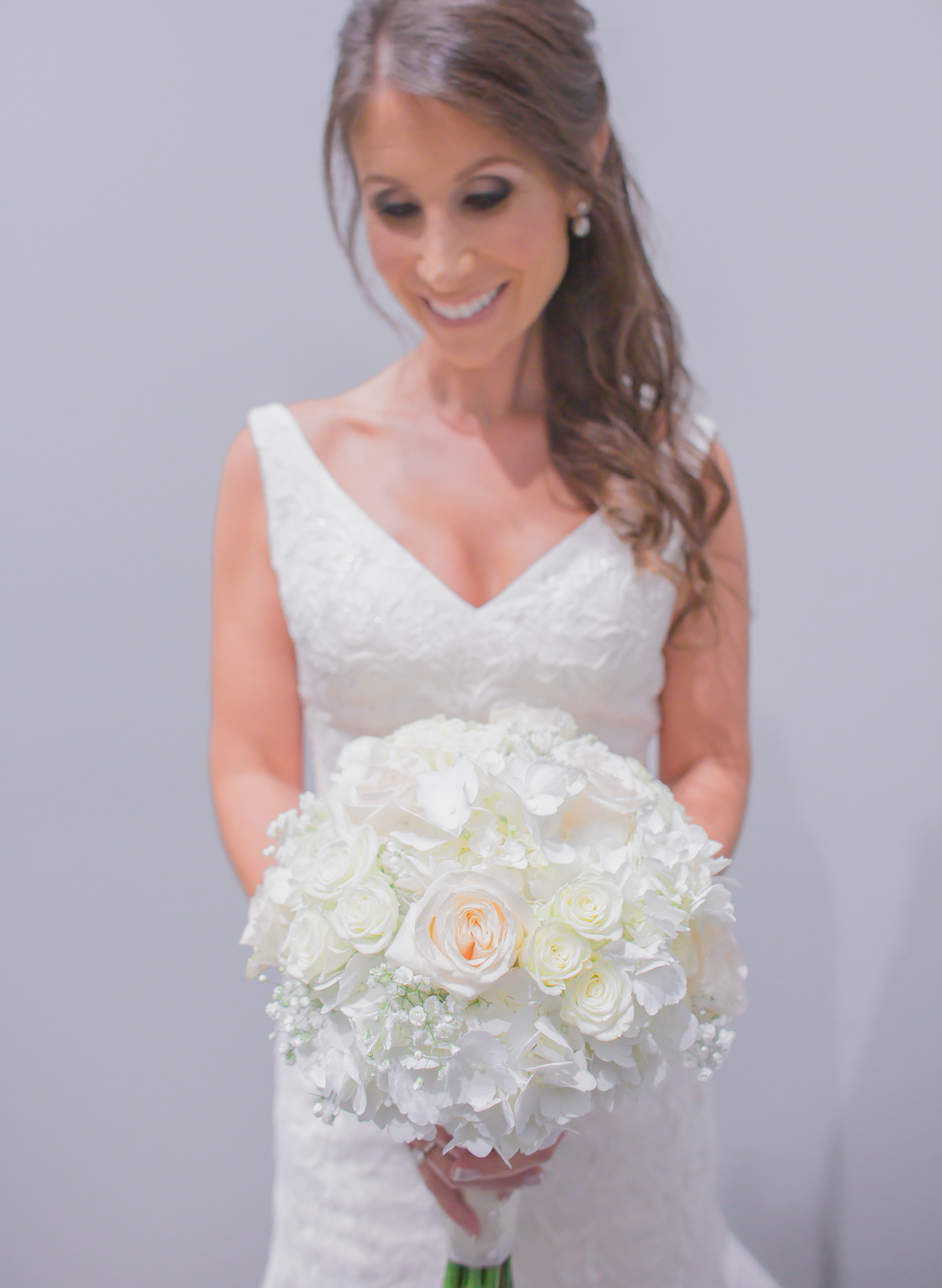 the bride and her beautiful bouquet by Panache Style in Pompano Beach